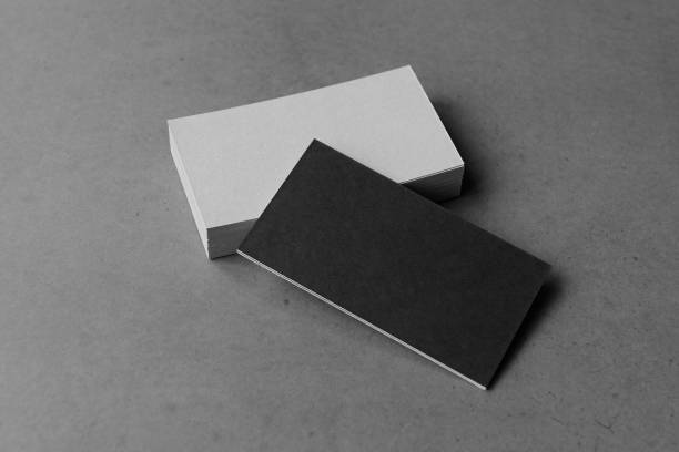 istock Business card on black background. 1406258574