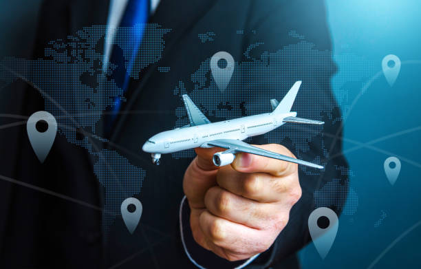 civil aviation and commercial airlines. travel and business trips. transport system and infrastructure. air communication. flights traffic. routes and directions. businessman or official with a plane. - airplane air vehicle business travel passenger imagens e fotografias de stock