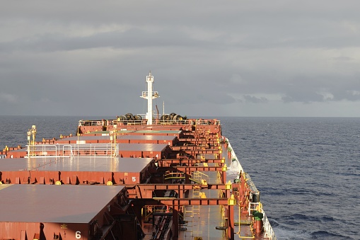 main deck area of a panamax  bulk carrier underway through ocean passage