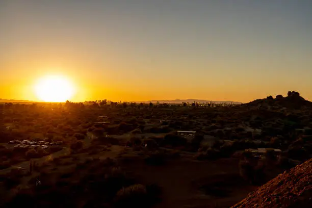 The view of sunset in Phoenix from Papago Park in Phoenix, Arizona