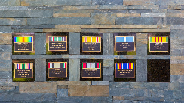 Kingman, Arizona - June 29, 2022: A wall at the Kingman Veterans Memorial along Route 66 showcasing the campaign ribbons for America's most recent wars.
