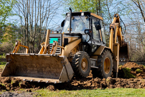 istock An excavator is digging the ground in the countryside in spring 1406278332