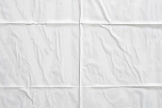 istock white crumpled and creased paper poster texture background 1406278424