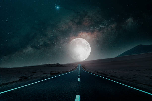 istock road to the moon in the desert background 1406289016
