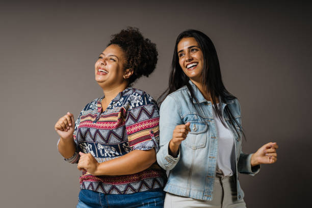 istock Two happy and relaxed women in studio 1406290079