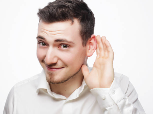 istock Young business man hearing something 1406293215