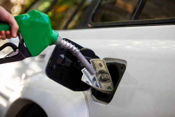 istock Gas Prices Increasing at the Pump Station 1406298597