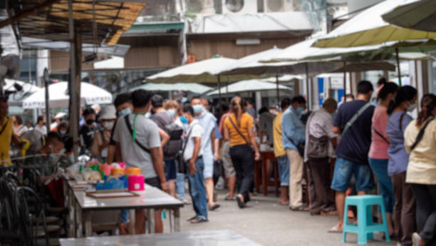 istock Chanthaburi gemstone market. People selling gemstones. Blurred image. 1406303877