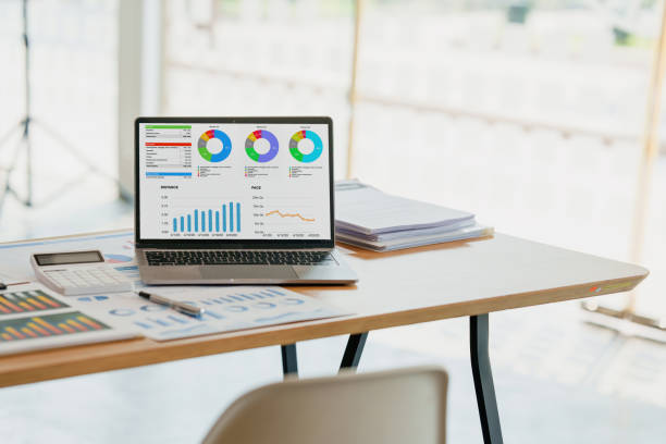 istock Business Finance audit tax Concept. Laptop and analytics program on screen. 1406305523