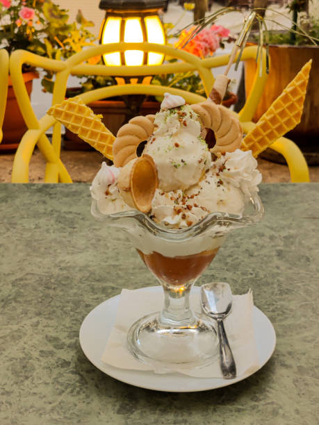 istock Icecream in a glass cup on the table 1406306625