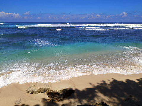 Big waves and seascape view at Green Bowl beach, located on the Bukit Peninsula, Bali, Indonesia