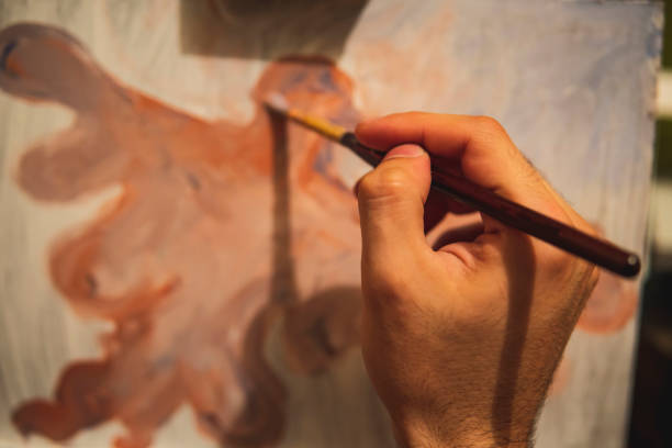 istock Painting an Orange eagle on a small canvas. 1406320649