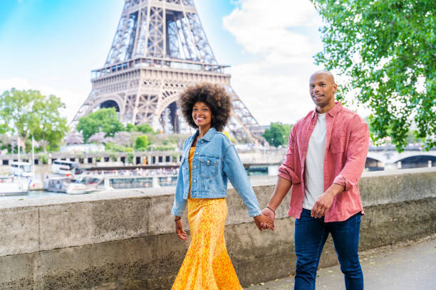 istock Afro-american beautiful couple in love visiting Paris 1406320962