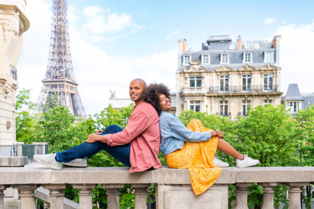 istock Afro-american beautiful couple in love visiting Paris 1406321179