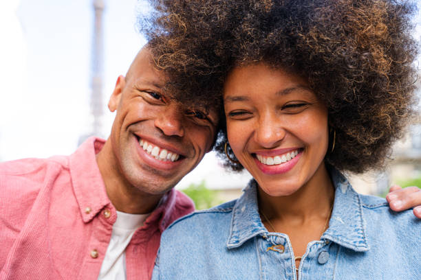 istock Afro-american beautiful couple in love visiting Paris 1406321829