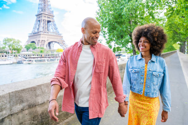 istock Afro-american beautiful couple in love visiting Paris 1406321957
