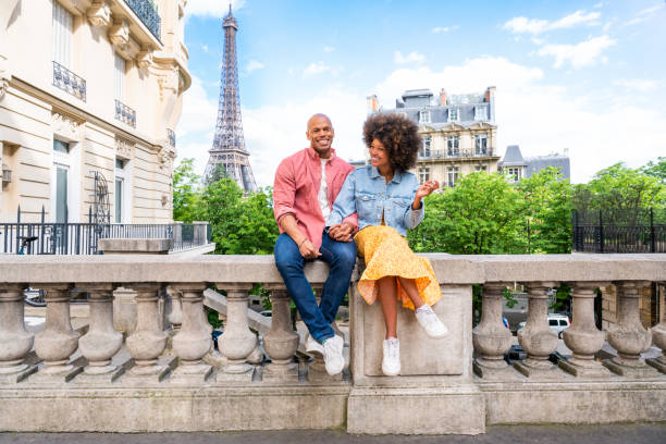 istock Afro-american beautiful couple in love visiting Paris 1406322201