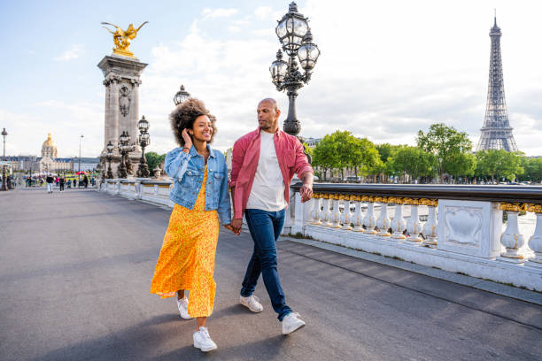 istock Afro-american beautiful couple in love visiting Paris 1406322221