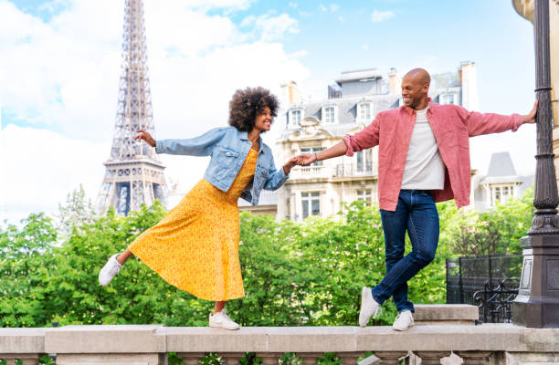 istock Afro-american beautiful couple in love visiting Paris 1406323897