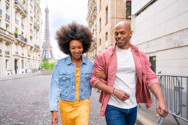 istock Afro-american beautiful couple in love visiting Paris 1406324926