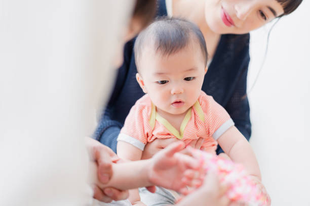istock Mothers watching their babies grow up 1406325990