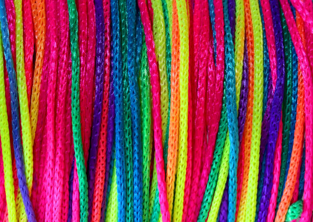 istock colorful background made with many multicolored threads and strings yellow red green blue Magenta 1406327687