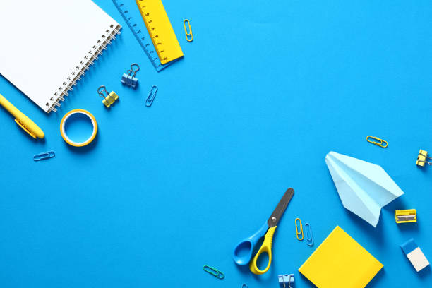istock School supplies on blue background. Flat lay, top view. Back to school concept. 1406331485