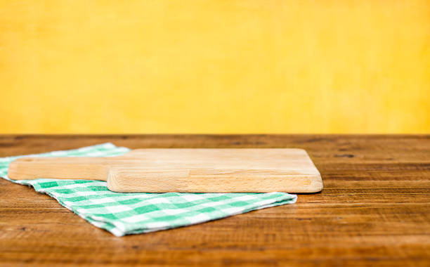 istock cutting board and napkin on wooden table 1406334742