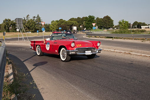 Cape Town, South Africa - February 3, 2015:  A 2005 Mercedes-Benz CLK500 convertible parked outside, top down, next to the sea in Cape Town, South Africa on a sunny summer day. Ample copy space on the clear blue sky.