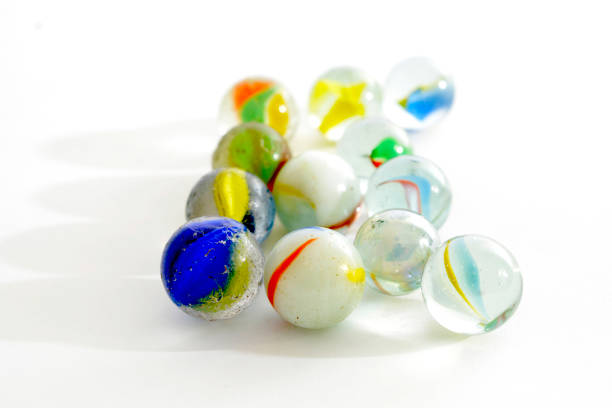 istock Glass marble studio close up shot on white 1406341785