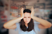 Sick Woman Suffering a Terrible Headache Entering Pharmacy for Help