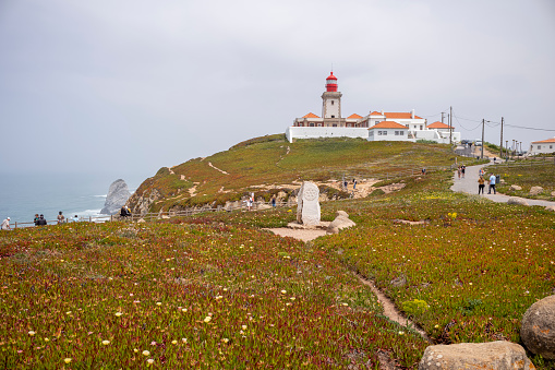 The lighthouse at Cabo da Roca the westernmost point of Europe in Portugal in summer at day.