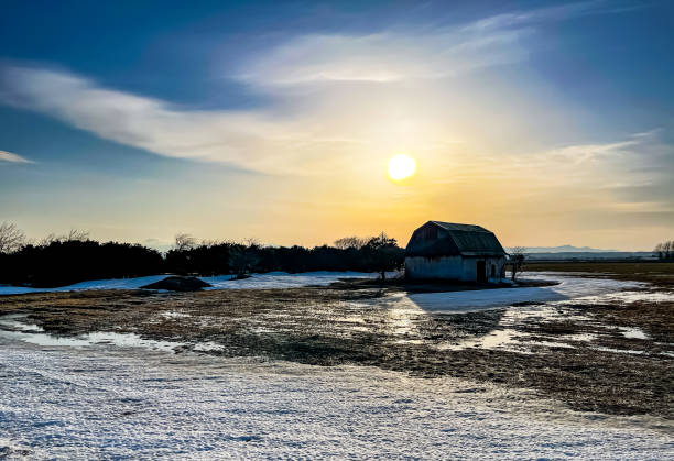 istock A snowmelting farm shining in the sunset 1406348977