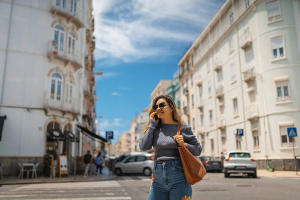 istock Woman on the phone in Lisbon 1406349211