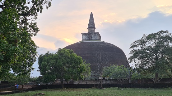 Polonnaruwa, Sri Lanka – April 21, 2022: Frontal view of Rankot Vihara Stupa in Polonnaruwa, Sri Lanka.