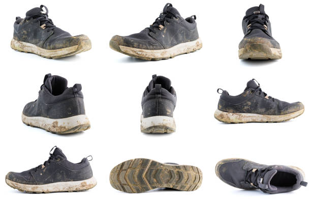set of dirty sport shoe sneaker isolated on white background in different position