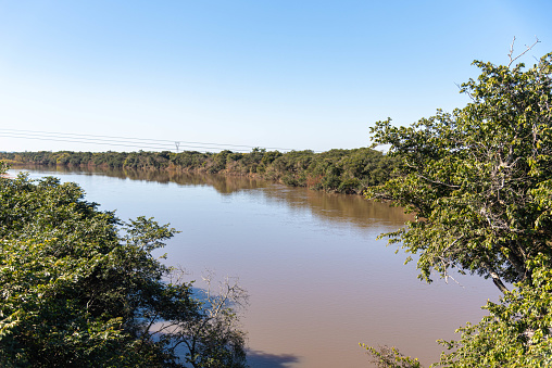 Margins of the Ibicui River in southern Brazil. The Ibicuí River is a Brazilian river located in the state of Rio Grande do Sul. It is a tributary of the Uruguay River.