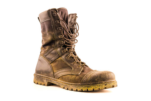 istock dirty military style light ankle boot isolated on white background 1406350443