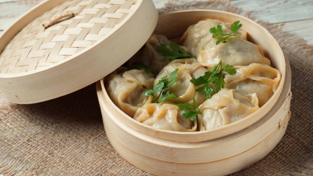 istock Manti, dumplings with minced meat wrapped in unleavened dough and cooked by steaming 1406351537