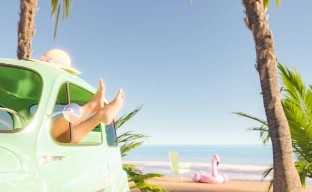 istock Woman in retro car resting on beach 1406357662