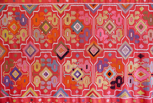 the fabric embroidered with oriental ornaments - background