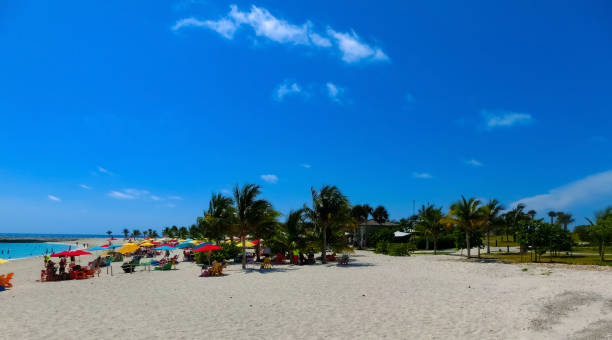 istock People resting at beach on Ocean Cay island 1406366160