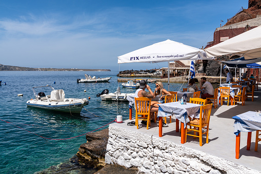 Santorini, Oia, Greece, Apr. 22 - Typical fish restaurant along the sea at Ammoudi Bay