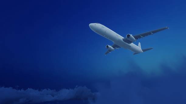 istock No logo passenger airplane flying over night cloud 1406370313