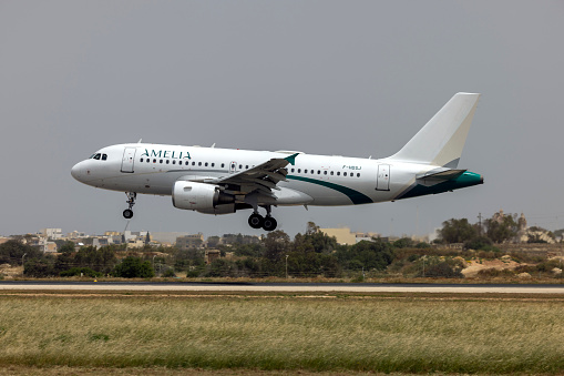 Luqa, Malta - May 6, 2022: Amelia International Airbus A319-112 (REG: F-HDSJ) arriving in an already hot midday for the beginning of May.