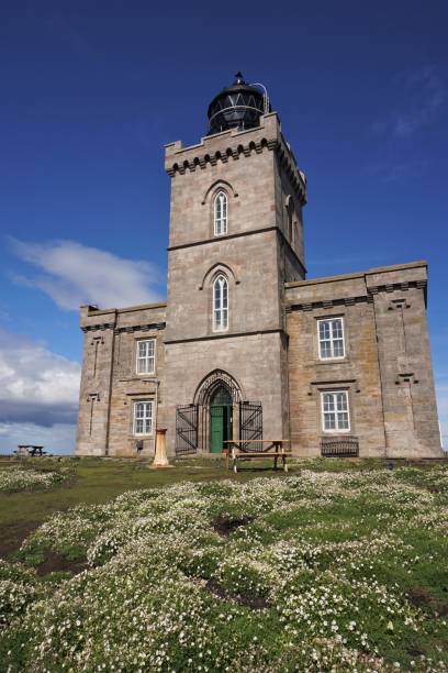 isle of peut phare - may photos et images de collection