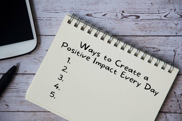 istock Top view of text - Ways to create a positive impact every day. 1406382501