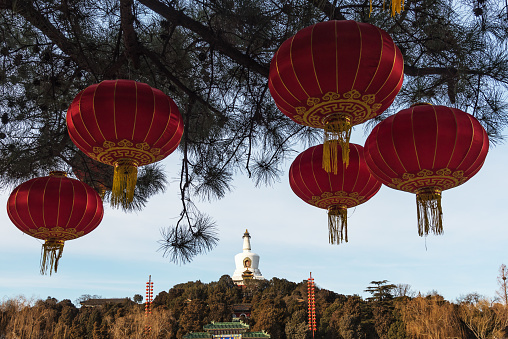 The White Pagoda in Beihai Park in Beijing under the blue sky and white clouds