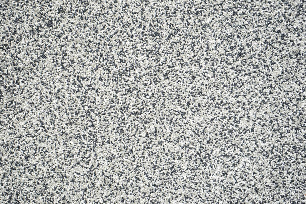istock Textured decorative stucco on exterior wall of the building. 1406390969