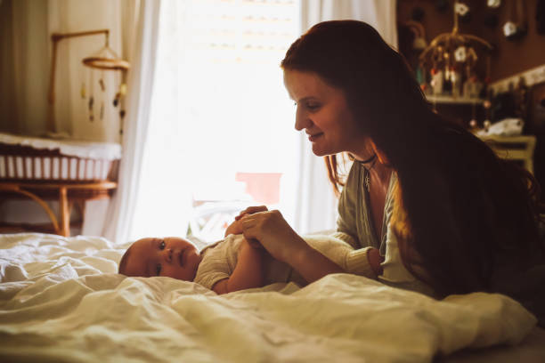 istock Plus size mom play with chubby baby 6 months in woolen eco diapers, 1406396623